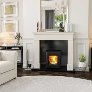 Elegant living room featuring a white fireplace suite Renoir & Aurora 650 electric fireplace ,glowing flames, neutral décor, and modern furnishings, Cork, Homexpert