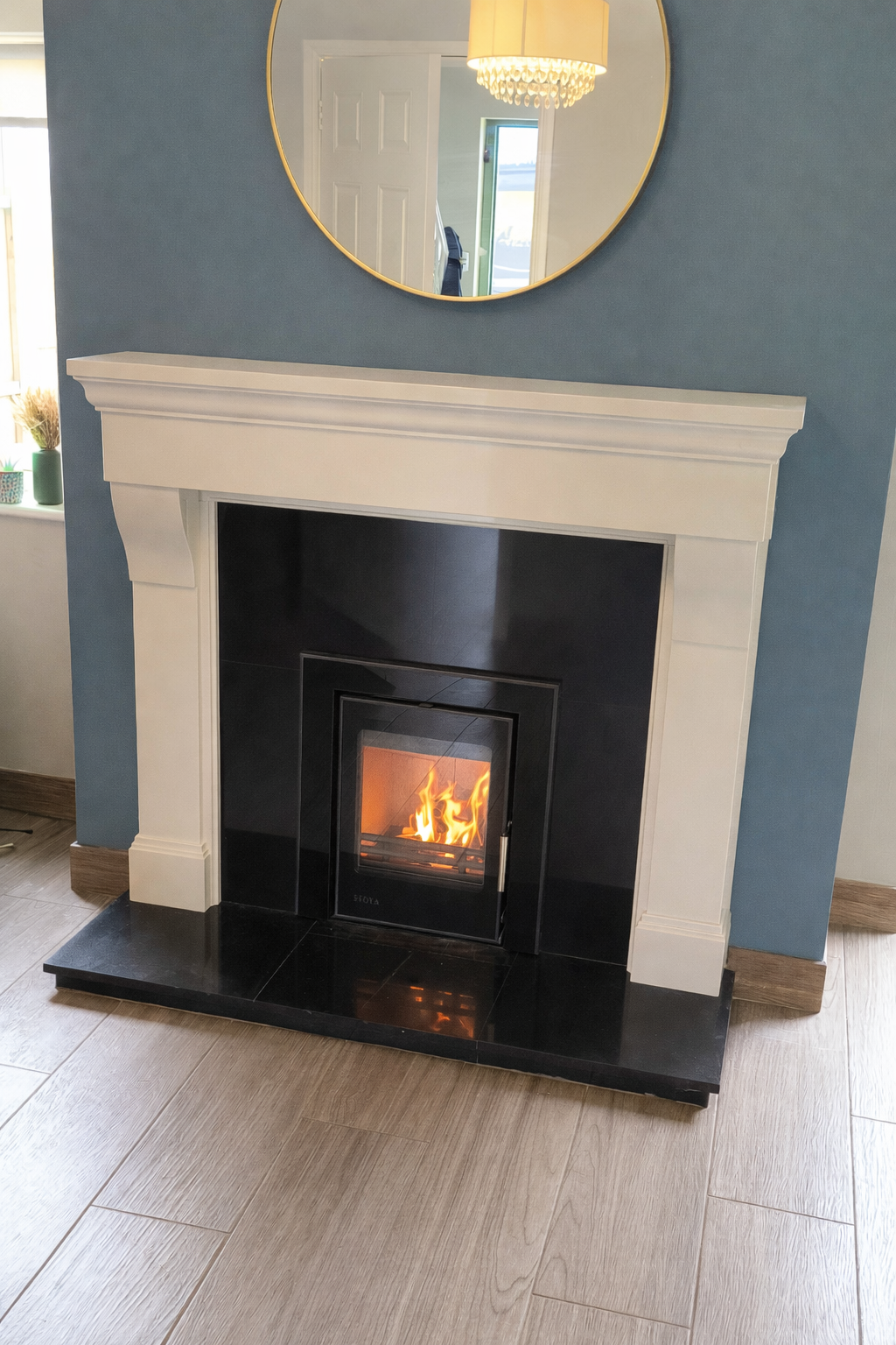 Multifuell Fireplace Insert installed with Cabra 54" Fireplace Surround in Cream